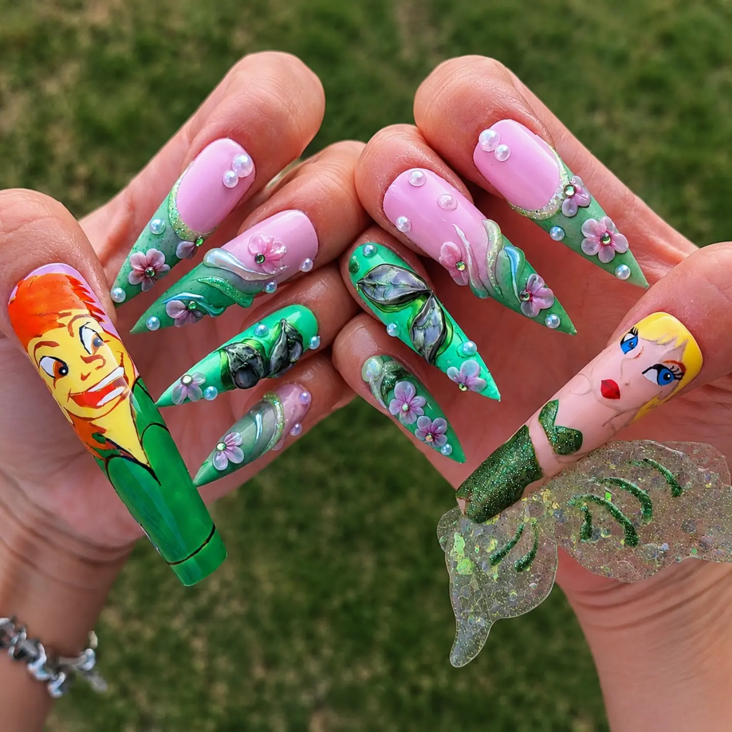 Fairytale-inspired green, pink and hand-painted 3D nail art
